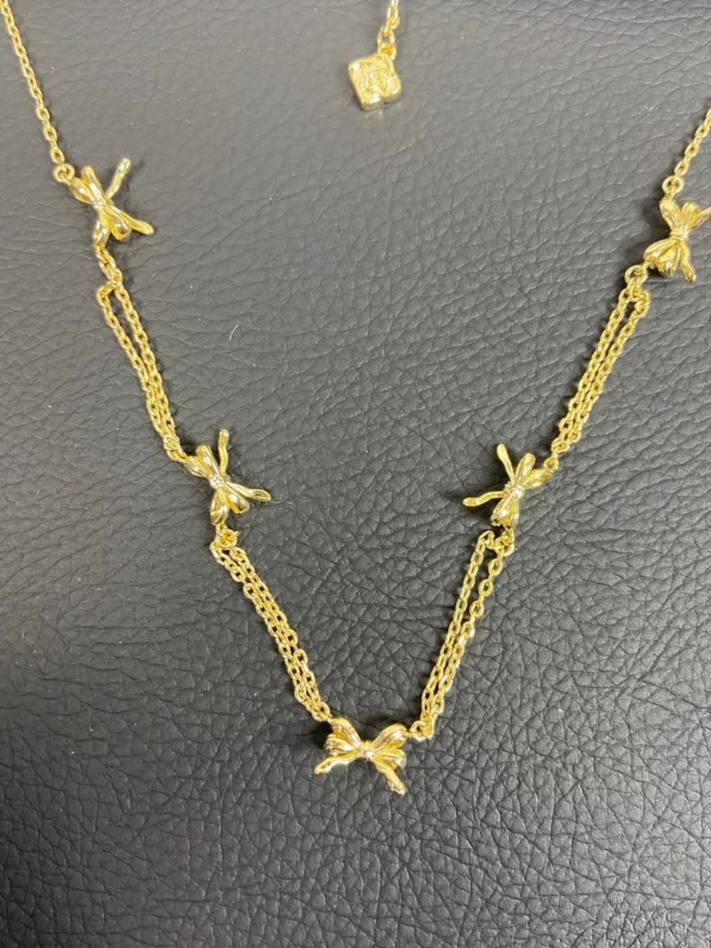 Kendra Scott Gold Multi-Chain Necklace with Bow Accents